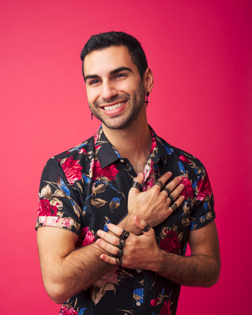 Kevin Kasir Gay Life Coach Smile Hand on Chest